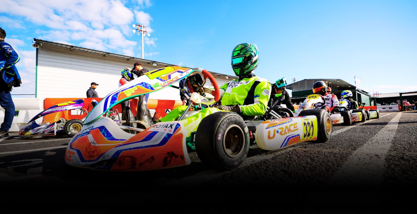 Driver racing a go-kart at the Urace track in Orlando